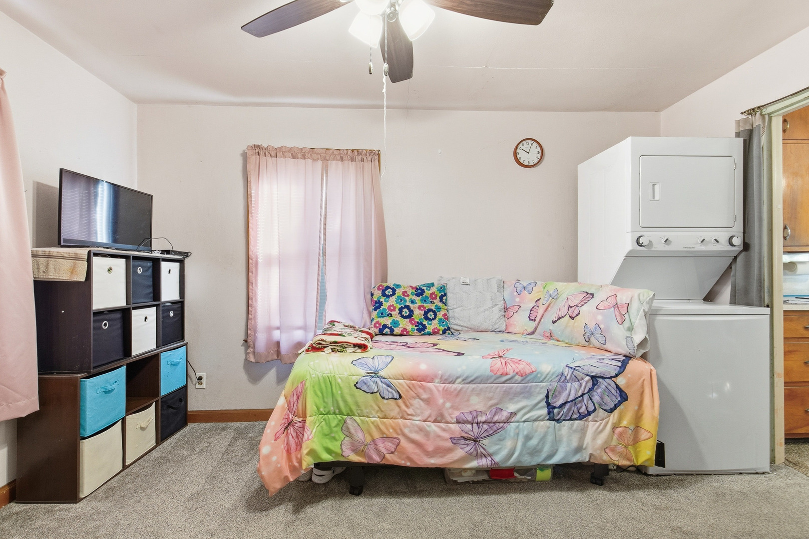 2400 47th Street Moline, IL 61265 - Photo 12 of 23 a bedroom with a bed and a book shelf