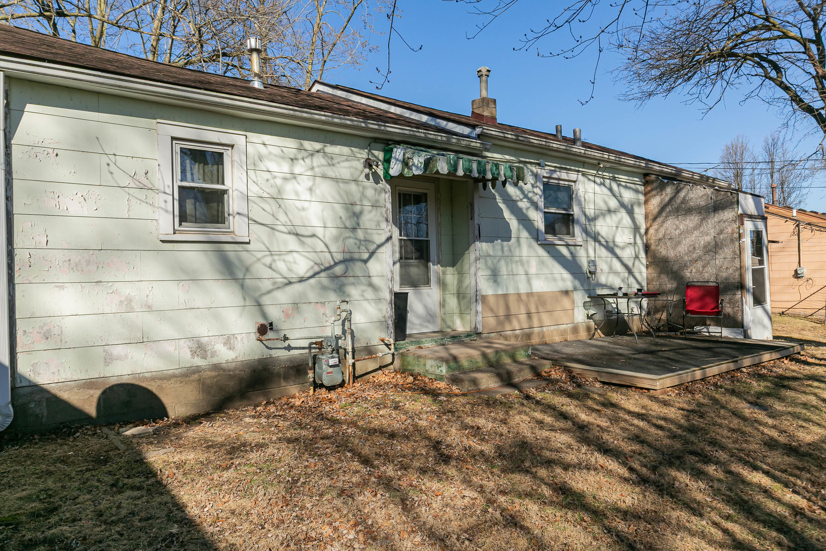2400 47th Street Moline, IL 61265 - Photo 20 of 23 a view of a house with a yard