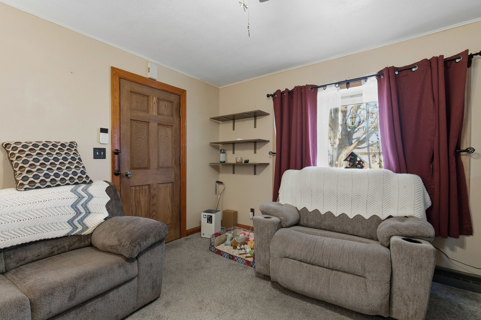 2400 47th Street Moline, IL 61265 - Photo 2 of 23 a living room with furniture and a window