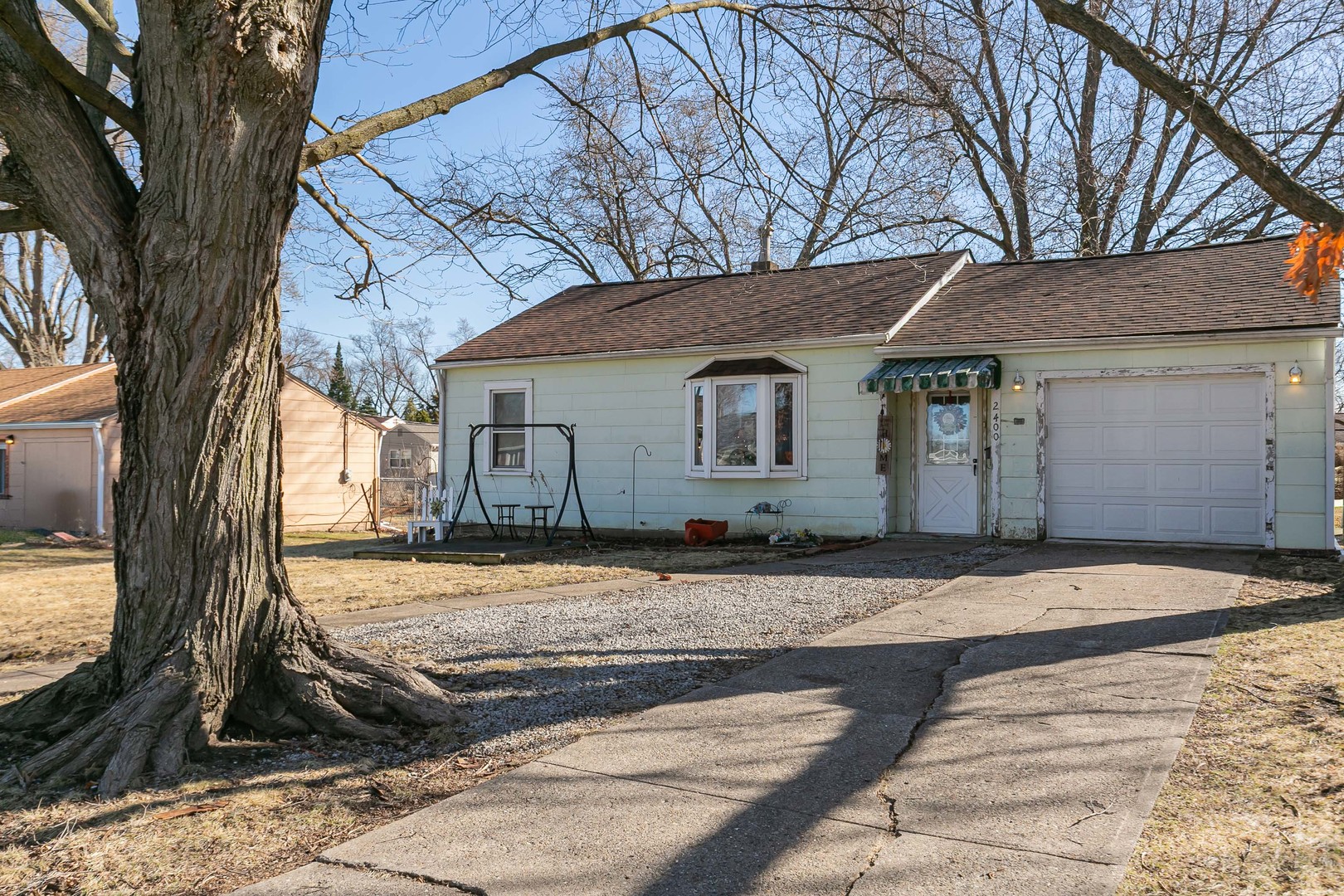 2400 47th Street Moline, IL 61265 - Photo 23 of 23 a view of a house with a yard covered with snow