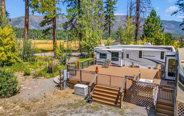 an outdoor view of the house with swimming pool