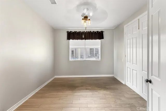 a view of an empty room and window