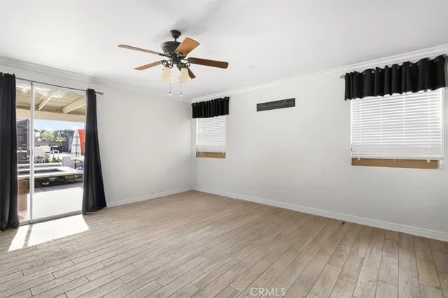 a spacious bathroom with a shower sink and a mirror