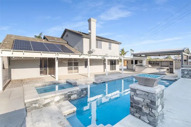 a front view of a building with outdoor space