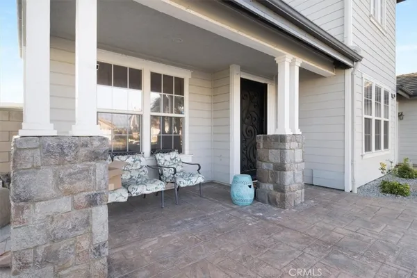 a view of a porch with seating space
