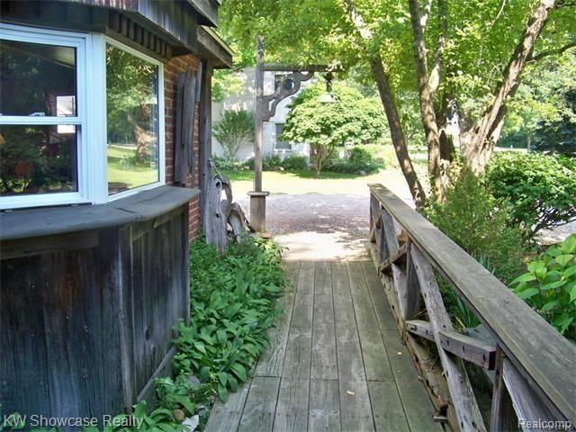 47200 West 11 Mile Road Novi, MI 48374 - Photo 7 of 62 Walk Way to Front Covered Porch
