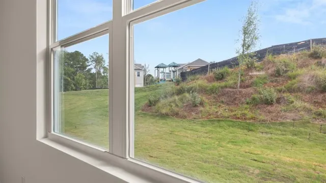 an empty room with windows