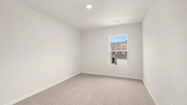 a view of a house with backyard porch and sitting area