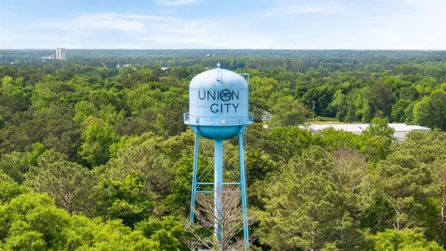 a front view of a house with a yard table and chairs