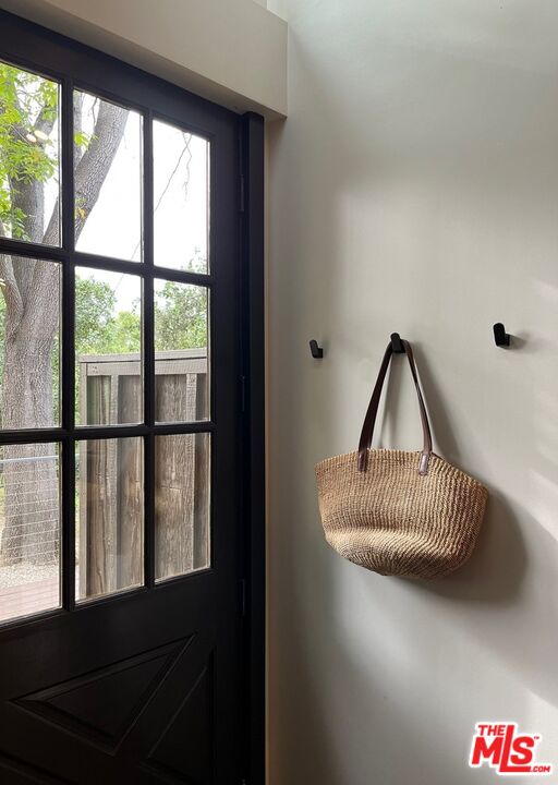 21273 Entrada Road Topanga, CA 90290 - Photo 19 of 70 a front view of a house with entryway