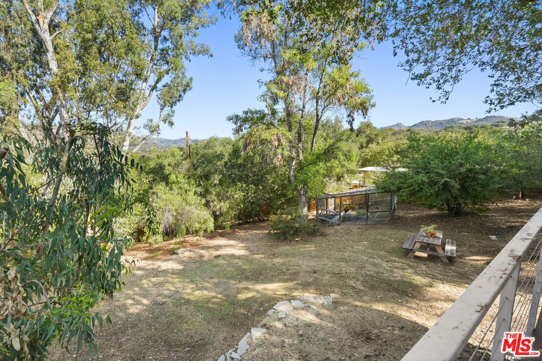 21273 Entrada Road Topanga, CA 90290 - Photo 21 of 70 a view of a small pool with a yard