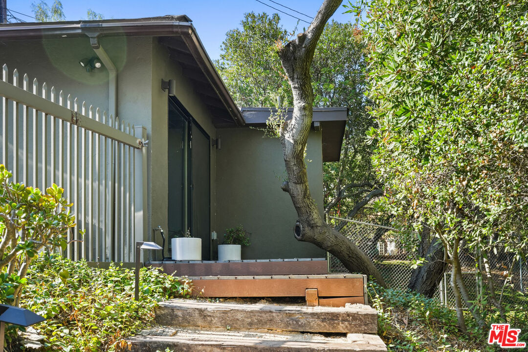 21273 Entrada Road Topanga, CA 90290 - Photo 57 of 70 a view of a house with a yard