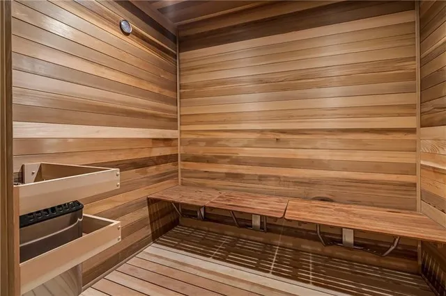 a view of room with wooden floor