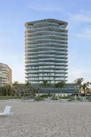 a large kitchen with a table and chairs