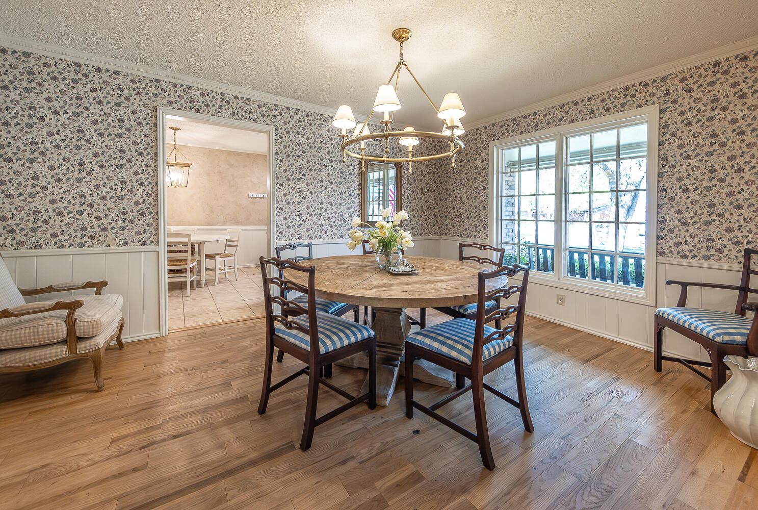 4411 88th Street Lubbock, TX 79424 - Photo 12 of 38 a view of a dining room with furniture window and outside view