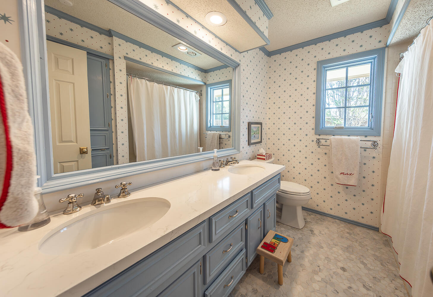 4411 88th Street Lubbock, TX 79424 - Photo 22 of 38 a bathroom with a granite countertop sink mirror and a bathtub