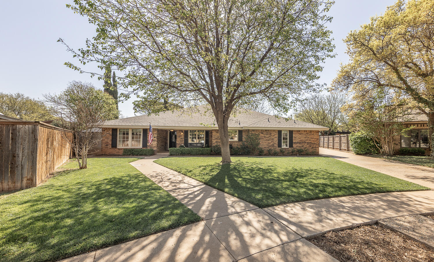 4411 88th Street Lubbock, TX 79424 - Photo 36 of 38 a view of a house with a yard