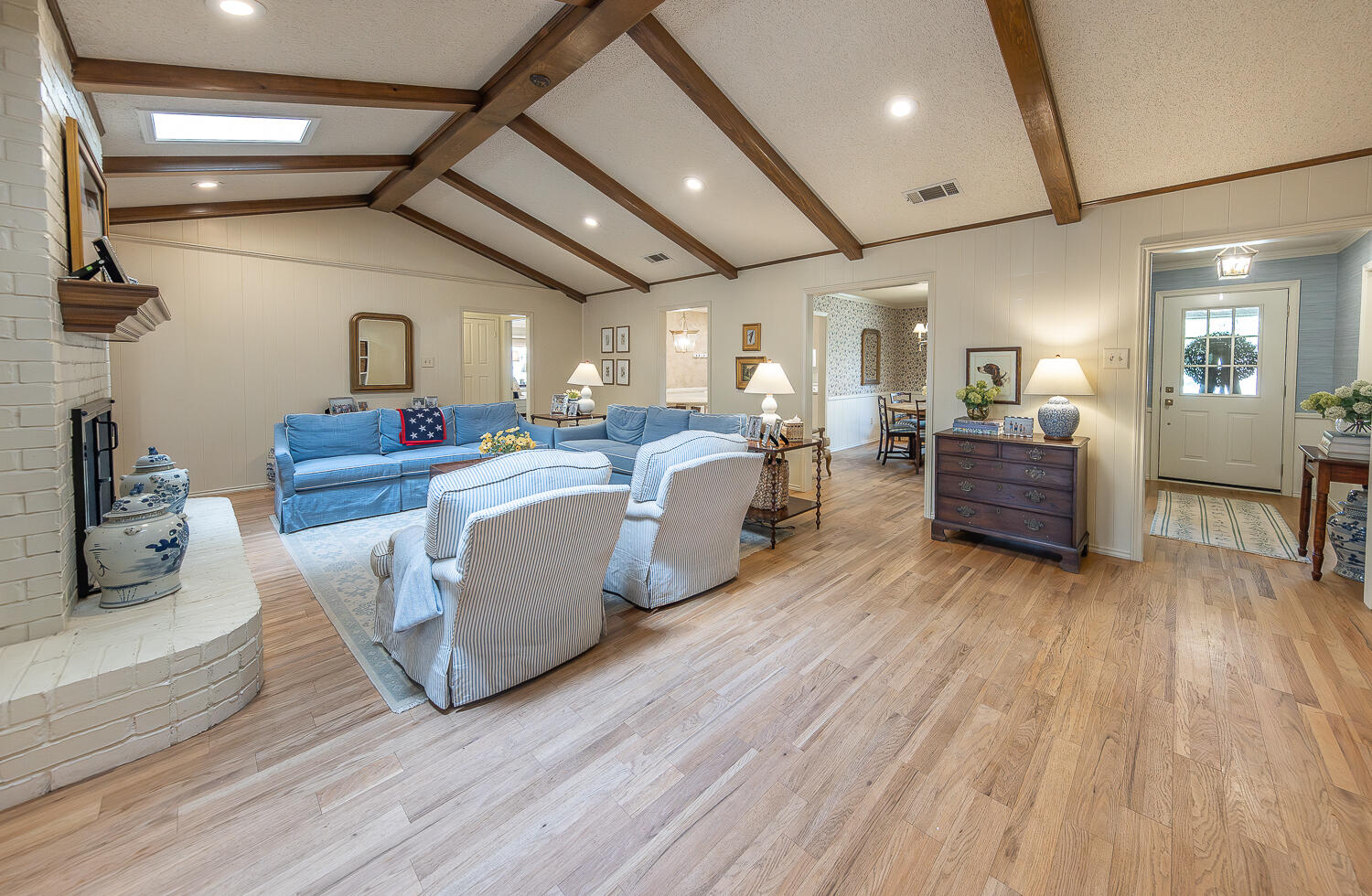 4411 88th Street Lubbock, TX 79424 - Photo 5 of 38 a living room with furniture and wooden floors