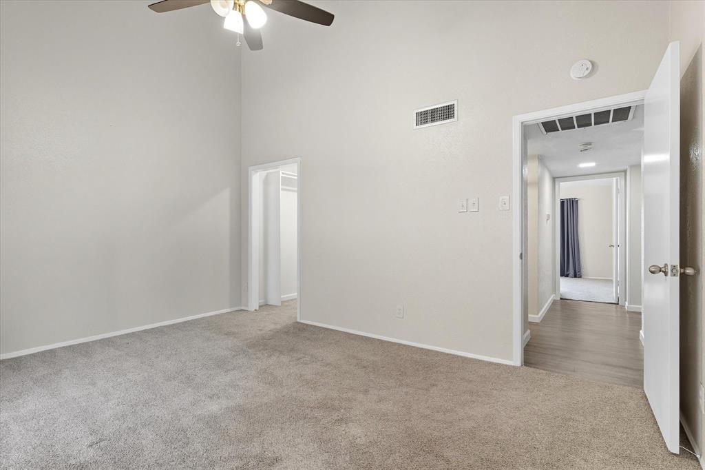 4539 North O'Connor Road, Unit 2234 Irving, TX 75062 - Photo 13 of 20 a view of a hallway with a chandelier fan