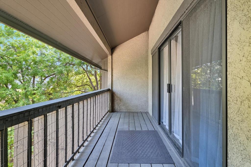 4539 North O'Connor Road, Unit 2234 Irving, TX 75062 - Photo 15 of 20 a view of a balcony with wooden floor