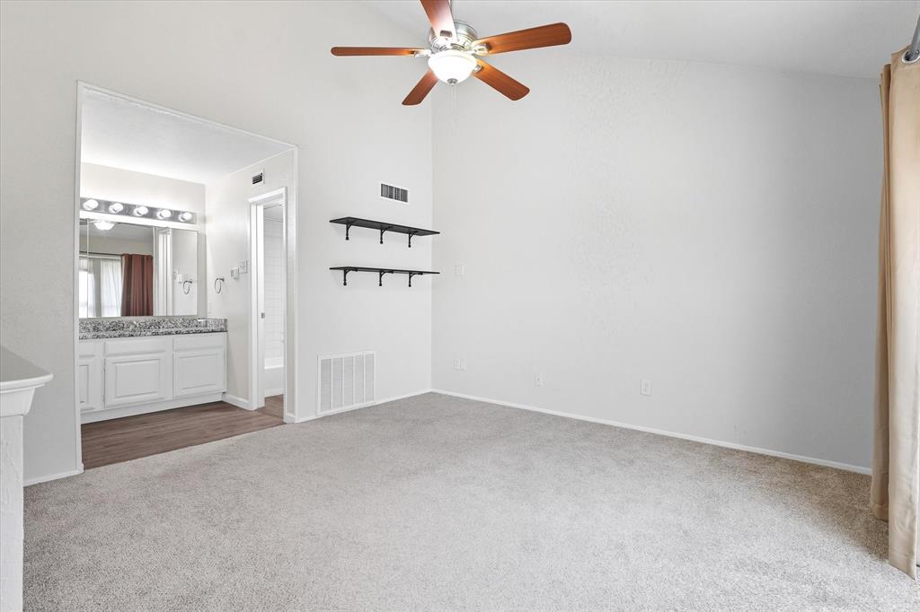 4539 North O'Connor Road, Unit 2234 Irving, TX 75062 - Photo 16 of 20 an empty room with cabinet and windows