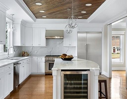 1 Aaron Road Lexington, MA 02421 - Photo 11 of 27 a kitchen with stainless steel appliances granite countertop a stove and refrigerator
