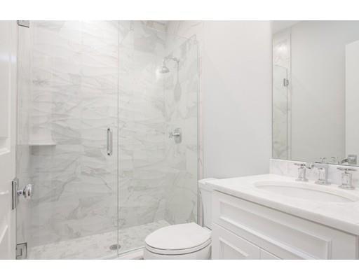 1 Aaron Road Lexington, MA 02421 - Photo 17 of 27 a bathroom with a sink a toilet and shower