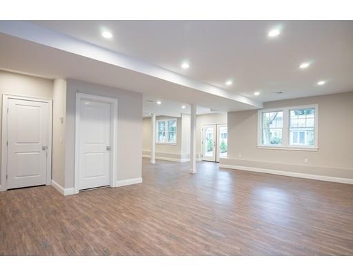 1 Aaron Road Lexington, MA 02421 - Photo 26 of 27 a view of an empty room with wooden floor and a window