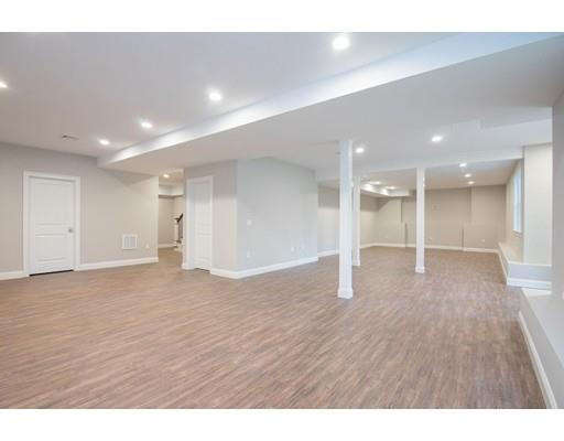 1 Aaron Road Lexington, MA 02421 - Photo 27 of 27 a view of an empty room with wooden floor