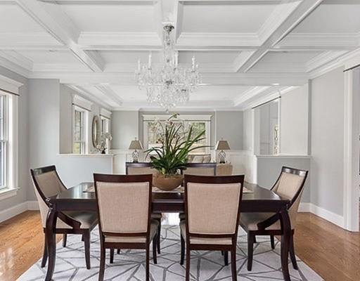 1 Aaron Road Lexington, MA 02421 - Photo 9 of 27 a view of a dining room with furniture a chandelier and wooden floor