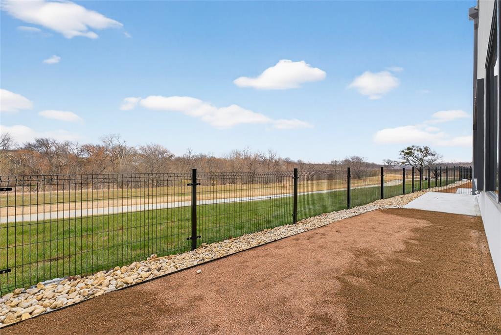 1111 Raiford Road, Unit 108 Carrollton, TX 75007 - Photo 21 of 39 a view of a backyard