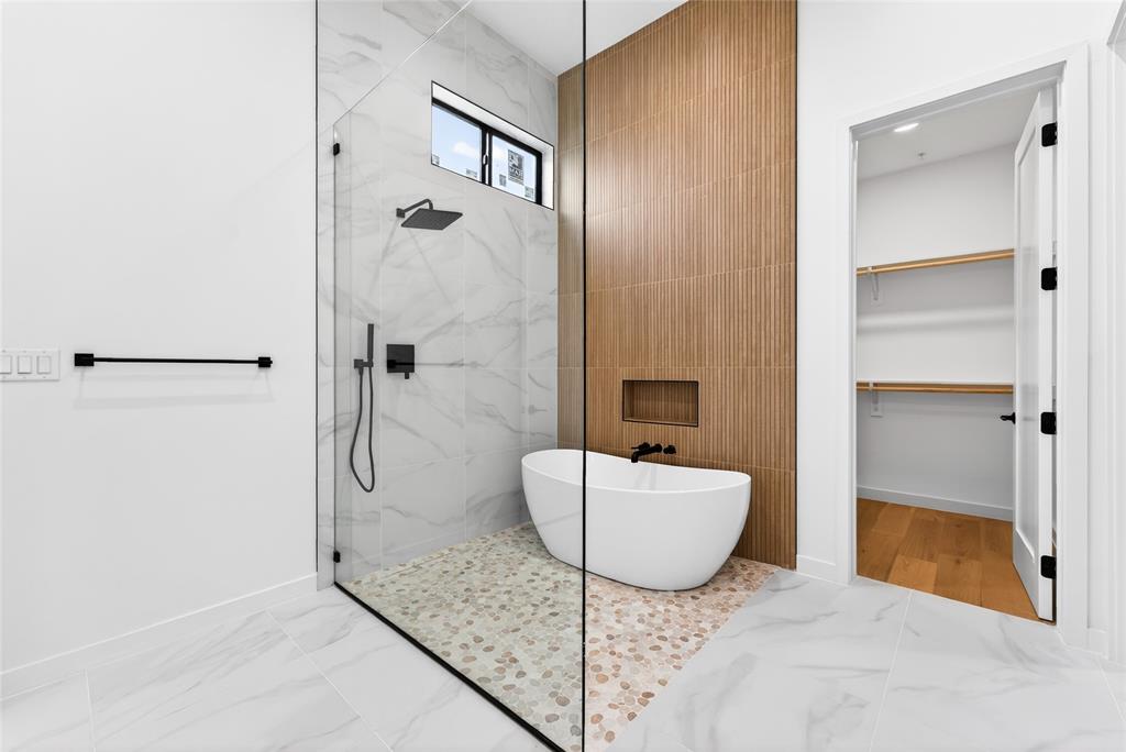 1111 Raiford Road, Unit 108 Carrollton, TX 75007 - Photo 30 of 39 a bathroom with a granite countertop shower a sink and a mirror