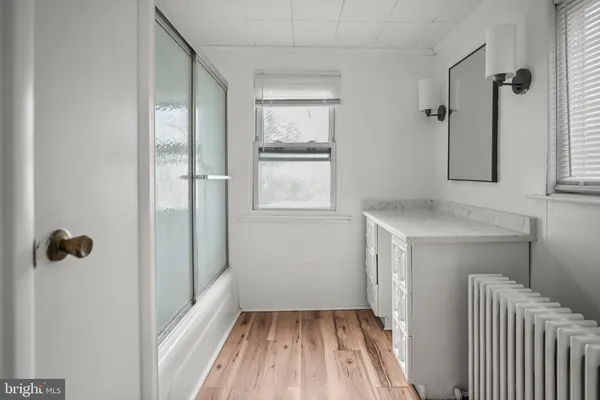 a view of walk in closet with window