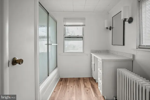a view of walk in closet with window