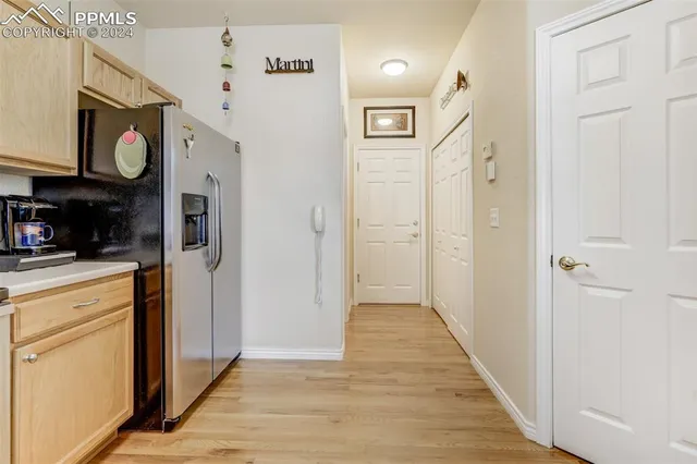 a view of hallway with washer and dryer