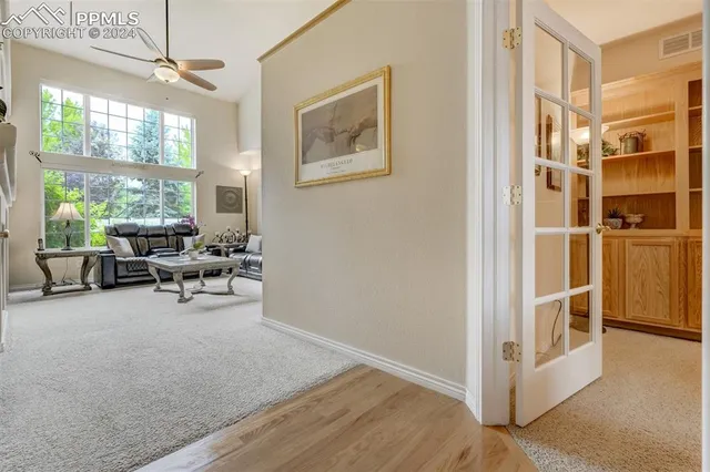 a view of a livingroom with furniture and windows