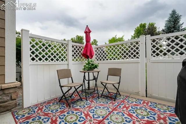 a view of a workspace with furniture