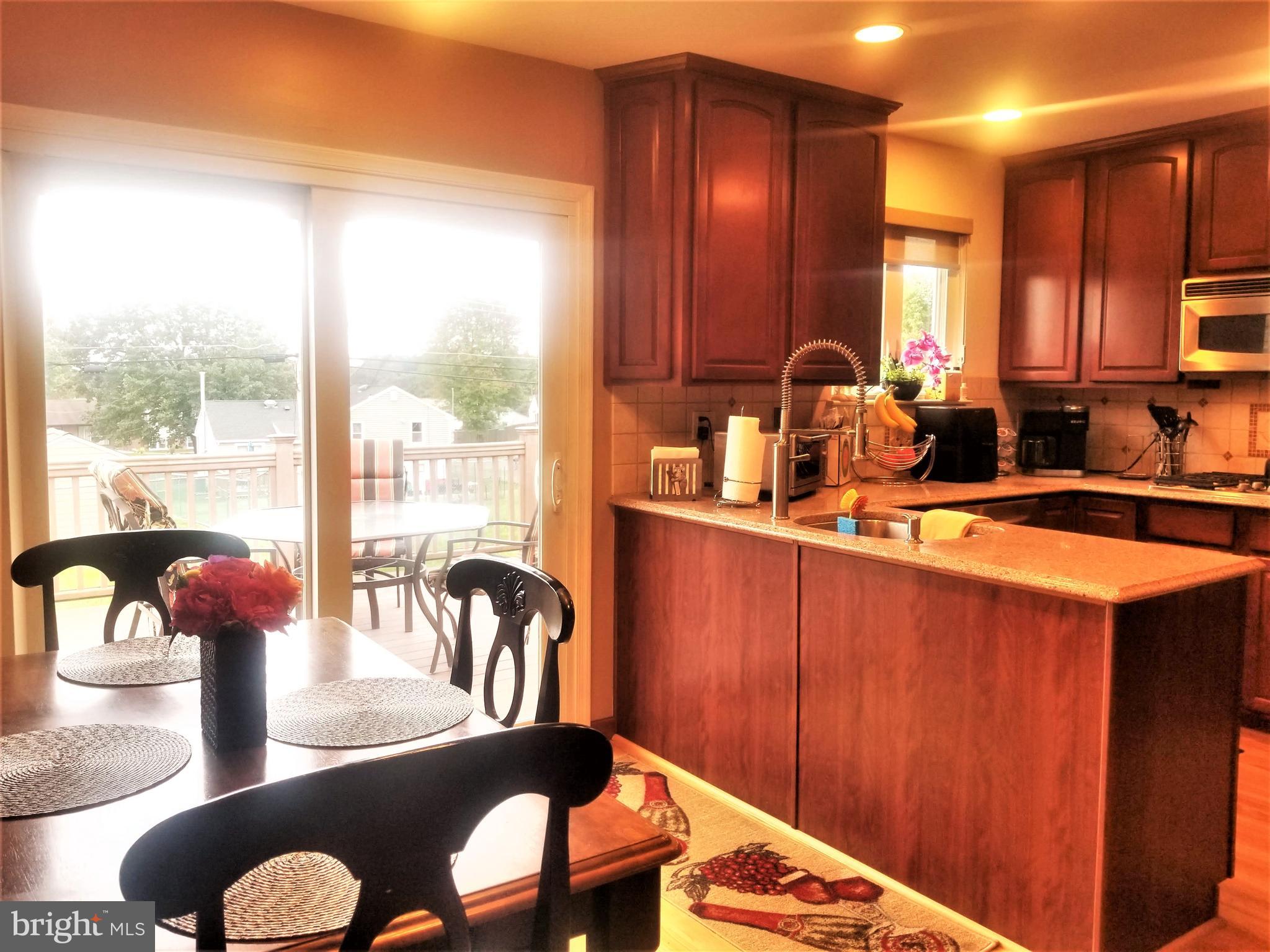 835 Stephen Road Warminster, PA 18974 - Photo 24 of 52 Slider off Dining area to deck