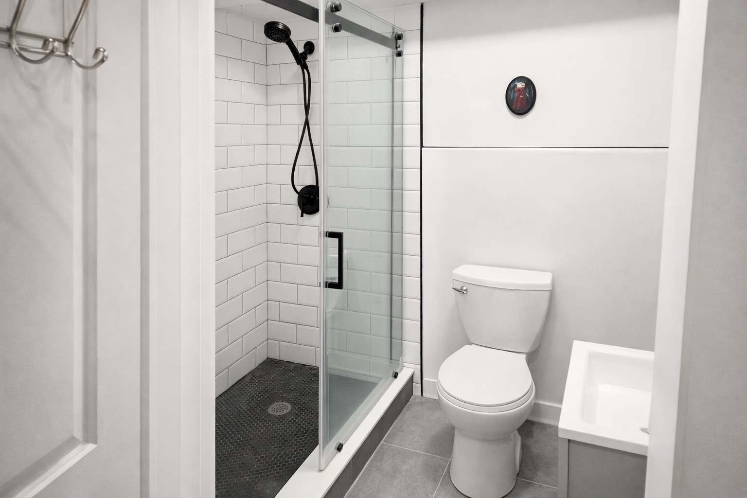 2957 North Milwaukee Avenue, Unit S2 Chicago, IL 60618 - Photo 4 of 6 a bathroom with a toilet and a shower