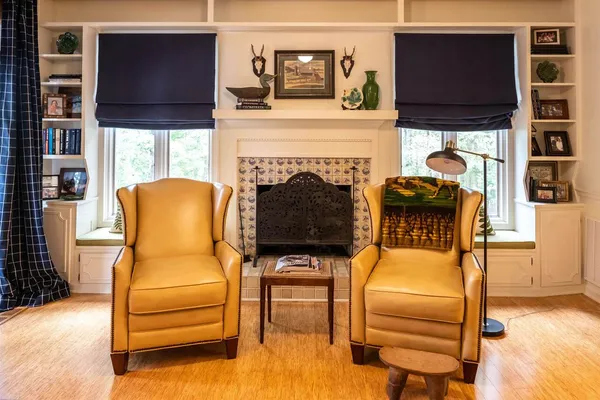 a room with furniture and a flat screen tv