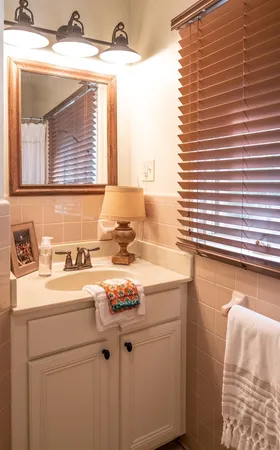 a view of a swimming pool and an outdoor seating