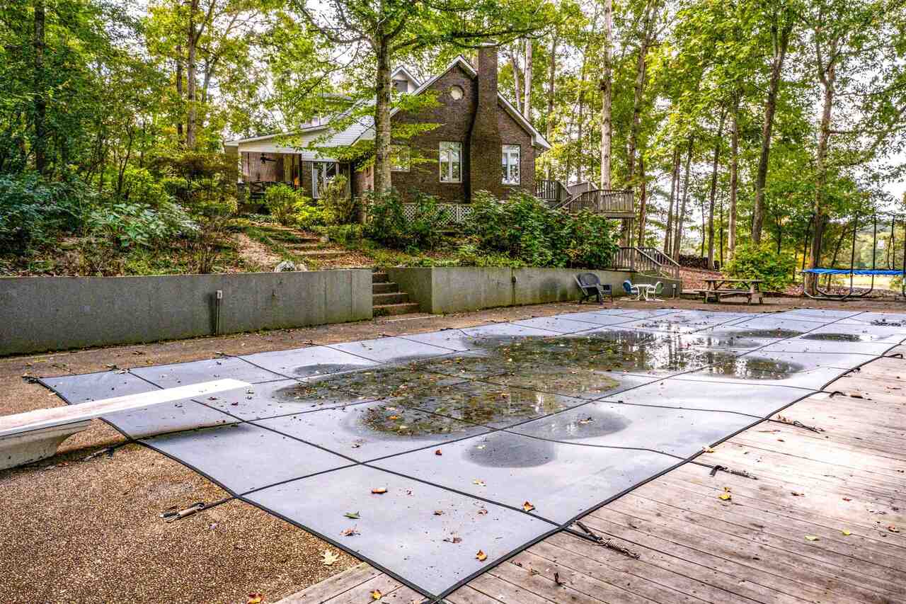 183 Madden Road Bowdon, GA 30108 - Photo 56 of 79 a view of a brick house with many windows