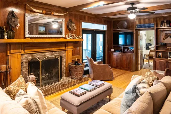 a room with furniture and a chandelier