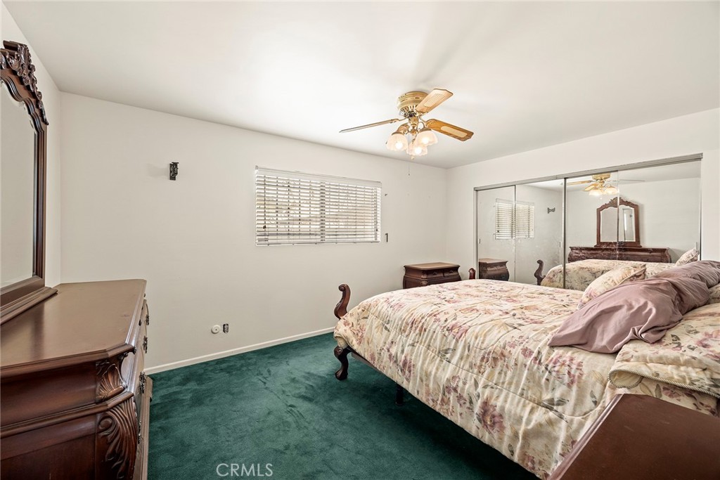 19409 Belshaw Avenue Carson, CA 90746 - Photo 11 of 15 a bedroom with a bed and dresser