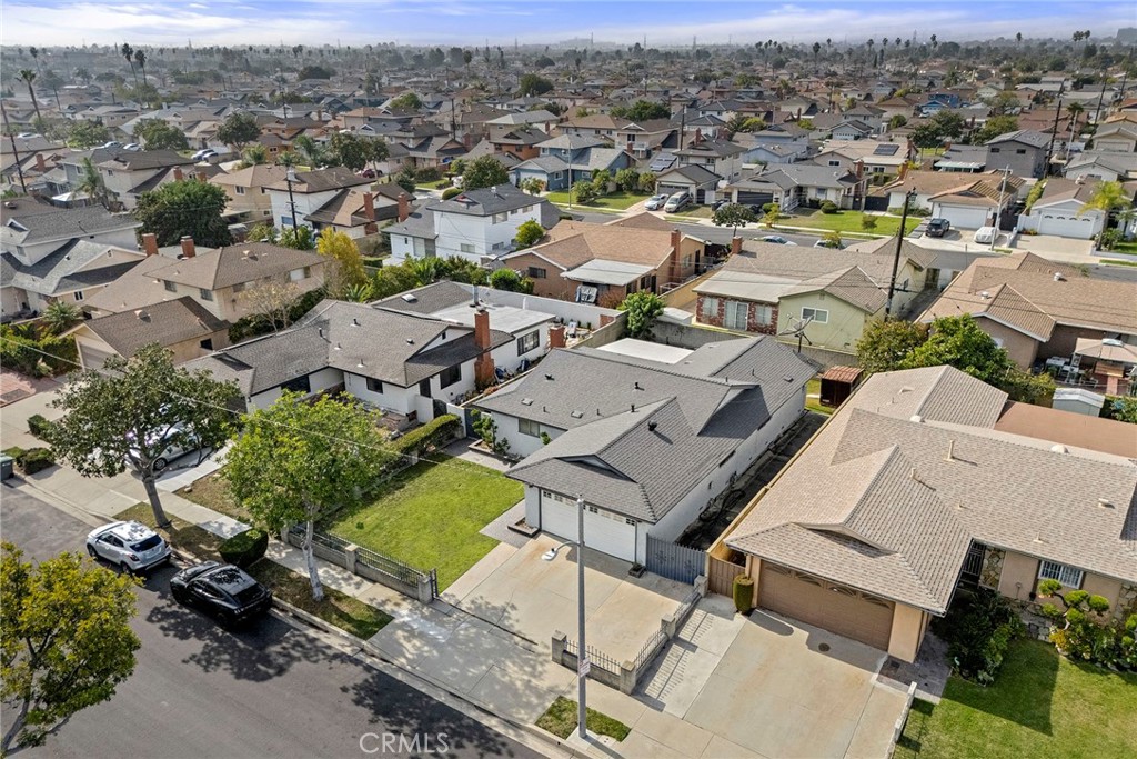 19409 Belshaw Avenue Carson, CA 90746 - Photo 4 of 15 an aerial view of a city with lots of residential buildings