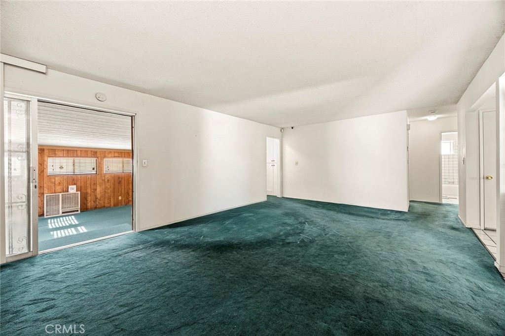 19409 Belshaw Avenue Carson, CA 90746 - Photo 6 of 15 a view of an empty room and window