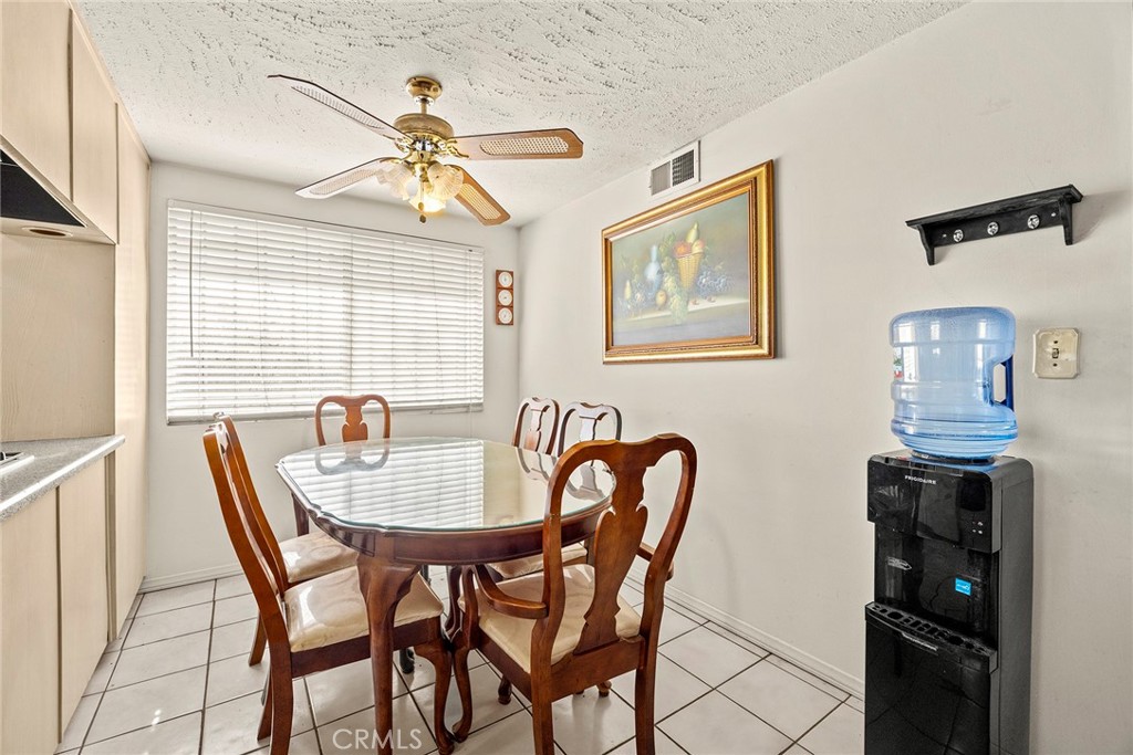 19409 Belshaw Avenue Carson, CA 90746 - Photo 9 of 15 a dining room with furniture and window