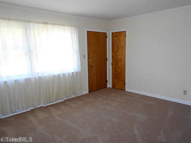 329 Bescher Chapel Road Trinity, NC 27370 - Photo 12 of 16 Living Room. Newly carpeted living room.