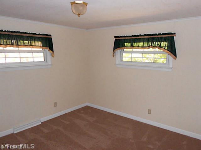 329 Bescher Chapel Road Trinity, NC 27370 - Photo 13 of 16 Master Bedroom. Newly carpeted master bedroom.