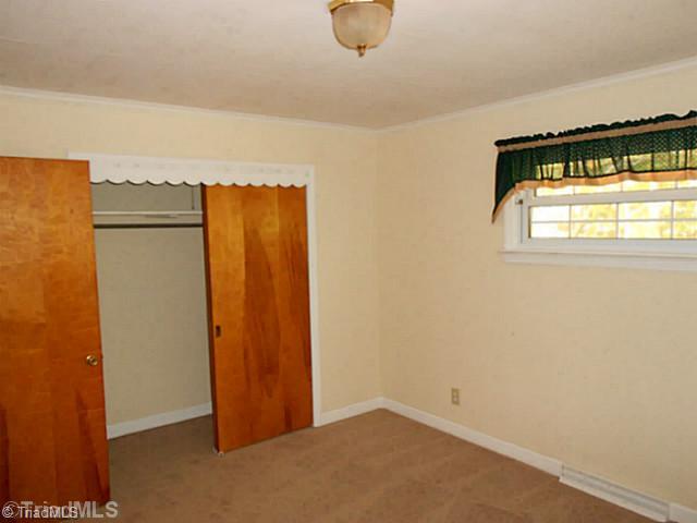 329 Bescher Chapel Road Trinity, NC 27370 - Photo 14 of 16 2nd Bedroom. Plenty of closet space.